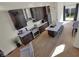 Modern kitchen with dark cabinets, quartz countertops, and island at 417 E Morris St, Indianapolis, IN 46225