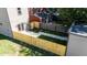 Small backyard with wooden fence and patio at 417 E Morris St, Indianapolis, IN 46225