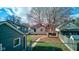 Pathway through backyard with tree at 385 S Arlington Ave, Indianapolis, IN 46219