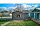 Gray shed with window in backyard at 385 S Arlington Ave, Indianapolis, IN 46219