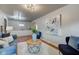 Spacious living room with modern decor and hardwood floors at 385 S Arlington Ave, Indianapolis, IN 46219