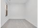 Bright bedroom with grey carpet and a window at 2081 Covey Dr, Danville, IN 46122