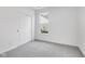 Bright bedroom with grey carpet and double door closet at 2081 Covey Dr, Danville, IN 46122