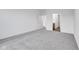 Bright bedroom with grey carpet and an ensuite bathroom at 2081 Covey Dr, Danville, IN 46122