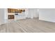 Open kitchen with an island and wood cabinets offering plenty of storage at 2081 Covey Dr, Danville, IN 46122