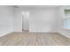 Bright living room featuring light gray vinyl flooring and an open floor plan at 2081 Covey Dr, Danville, IN 46122