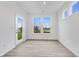 Bright office space with vinyl flooring and a door leading to the outdoors at 2081 Covey Dr, Danville, IN 46122