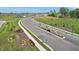 Aerial view of Quail West community entrance and landscaping at 2081 Covey Dr, Danville, IN 46122