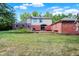 Home's backyard with deck and lawn at 9063 Dewberry Ct, Indianapolis, IN 46260