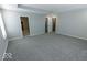 Main bedroom with carpet, access to bath and closet at 10257 Meadow Path Ln, Indianapolis, IN 46239