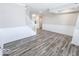 Gray wood-look floors and white wainscoting at 10257 Meadow Path Ln, Indianapolis, IN 46239