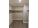 Large walk-in closet with built-in shelving at 10257 Meadow Path Ln, Indianapolis, IN 46239