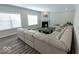 Living room with sectional sofa and corner fireplace at 10257 Meadow Path Ln, Indianapolis, IN 46239