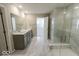 Elegant bathroom with double vanity, large shower, and marble floors at 10257 Meadow Path Ln, Indianapolis, IN 46239