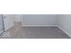 Empty bedroom with gray carpet and white doors at 10257 Meadow Path Ln, Indianapolis, IN 46239