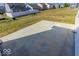 Large backyard with a concrete patio, offering ample space for recreation at 10257 Meadow Path Ln, Indianapolis, IN 46239