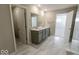 Double vanity bathroom with access to bedroom and shower at 10257 Meadow Path Ln, Indianapolis, IN 46239