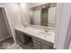 Double vanity bathroom with gray cabinets and quartz countertop at 10257 Meadow Path Ln, Indianapolis, IN 46239