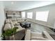 Living room with sectional sofa and kitchen view at 10257 Meadow Path Ln, Indianapolis, IN 46239