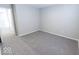 Bright bedroom with carpet flooring and access to upper floor at 10257 Meadow Path Ln, Indianapolis, IN 46239