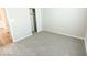 Bright bedroom featuring gray carpet and a large closet at 10257 Meadow Path Ln, Indianapolis, IN 46239