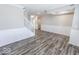 Gray wood-look floors and white wainscoting at 10257 Meadow Path Ln, Indianapolis, IN 46239