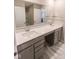 Double vanity bathroom with gray cabinets and quartz countertop at 10257 Meadow Path Ln, Indianapolis, IN 46239