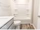 Clean bathroom, gray vanity, tub and shower at 10257 Meadow Path Ln, Indianapolis, IN 46239