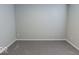 Empty bedroom with grey walls and carpet at 10257 Meadow Path Ln, Indianapolis, IN 46239