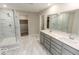 Elegant bathroom with double vanity, large shower, and marble floors at 10257 Meadow Path Ln, Indianapolis, IN 46239