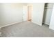 Bedroom with gray carpet, neutral walls and closet at 10257 Meadow Path Ln, Indianapolis, IN 46239