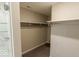 Bright walk-in closet with shelving and hanging rods at 10257 Meadow Path Ln, Indianapolis, IN 46239