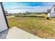 View of the side yard with a glimpse of the neighborhood at 10257 Meadow Path Ln, Indianapolis, IN 46239