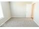 Well-lit bedroom with gray carpet and a window at 10257 Meadow Path Ln, Indianapolis, IN 46239
