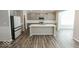 Modern kitchen with island and stainless steel appliances at 10257 Meadow Path Ln, Indianapolis, IN 46239