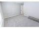 Simple bedroom with grey carpet and access to bathroom at 10257 Meadow Path Ln, Indianapolis, IN 46239