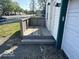 Small front porch with steps and simple lattice at 905 Crescent Dr, Anderson, IN 46013