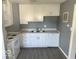 Modern kitchen featuring white cabinets and updated countertops at 905 Crescent Dr, Anderson, IN 46013