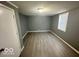 Simple bedroom with updated flooring and fresh paint at 905 Crescent Dr, Anderson, IN 46013