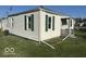 Side view of house with green shutters at 905 Crescent Dr, Anderson, IN 46013