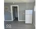 Bright kitchen with white cabinets and new appliances at 905 Crescent Dr, Anderson, IN 46013