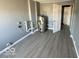 Laundry room with new flooring and water heater at 905 Crescent Dr, Anderson, IN 46013