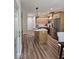 Open concept kitchen with stainless steel appliances and hardwood floors at 2170 Galleone Way, Plainfield, IN 46168