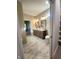Double vanity bathroom with marble floors and a toilet at 2170 Galleone Way, Plainfield, IN 46168