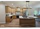 Modern kitchen with island and light wood cabinets at 2170 Galleone Way, Plainfield, IN 46168