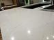 Close-up of a modern quartz countertop with subtle veining at 2170 Galleone Way, Plainfield, IN 46168