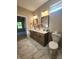 Elegant bathroom with double vanity, marble flooring, and a toilet at 2170 Galleone Way, Plainfield, IN 46168
