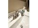 Modern bathroom sink with brushed nickel faucet and white countertop at 2170 Galleone Way, Plainfield, IN 46168