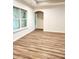 Spacious basement room with hardwood floors and large window at 2170 Galleone Way, Plainfield, IN 46168