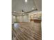 Open living room with hardwood floors and kitchen access at 2170 Galleone Way, Plainfield, IN 46168